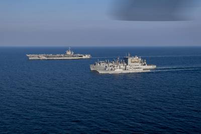 The aircraft carrier Dwight D. Eisenhower, the dry cargo ship USNS Alan Shepard and the guided-missile destroyer Gravely conduct a replenishment-at-sea in the Arabian Gulf, Dec. 8, 2023.