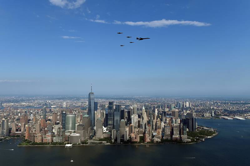 A B-1Lancer flies in formation with four F-35 Lightning II fighters over Manhattan as part of the "Salute to America" on July 4, 2020.