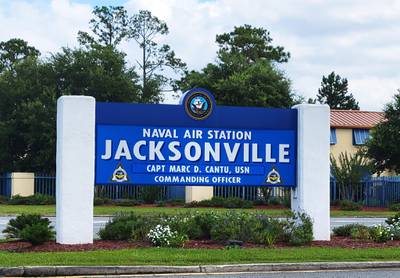 A man fleeing a hit-and-run crash died after slamming into a security barrier outside Naval Air Station Jacksonville, officials said.