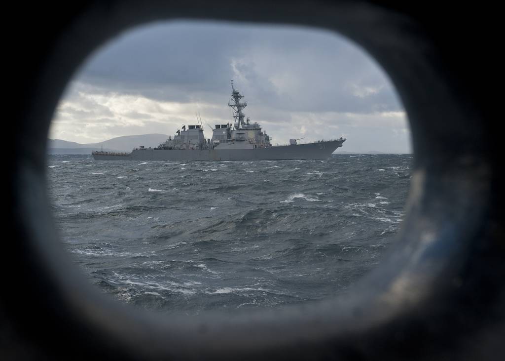 The guided-missile destroyer USS Arleigh Burke, lead ship of the Arleigh Burke-class guided missile destroyers, participates in a training exercise in North Minch, U.K., Oct. 9 2011.
