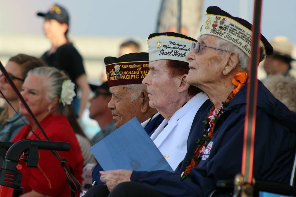 Pearl Harbor survivors and other military veterans observe a ceremony on Wednesday, Dec . 7, 2022 in Pearl Harbor, Hawaii in remembrance of those killed in the 1941 attack.