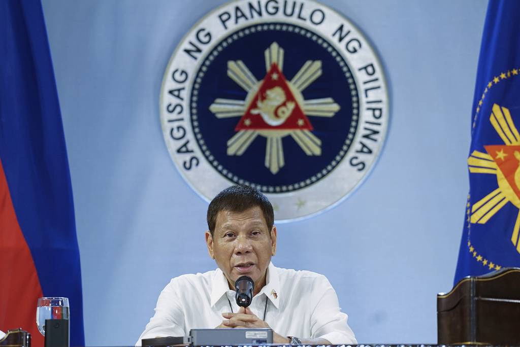 Philippine President Rodrigo Duterte gestures as he meets members of the Inter-Agency Task Force on the Emerging Infectious Diseases at the Malacanang presidential palace in Manila, Philippines on Monday, Dec. 7, 2020.