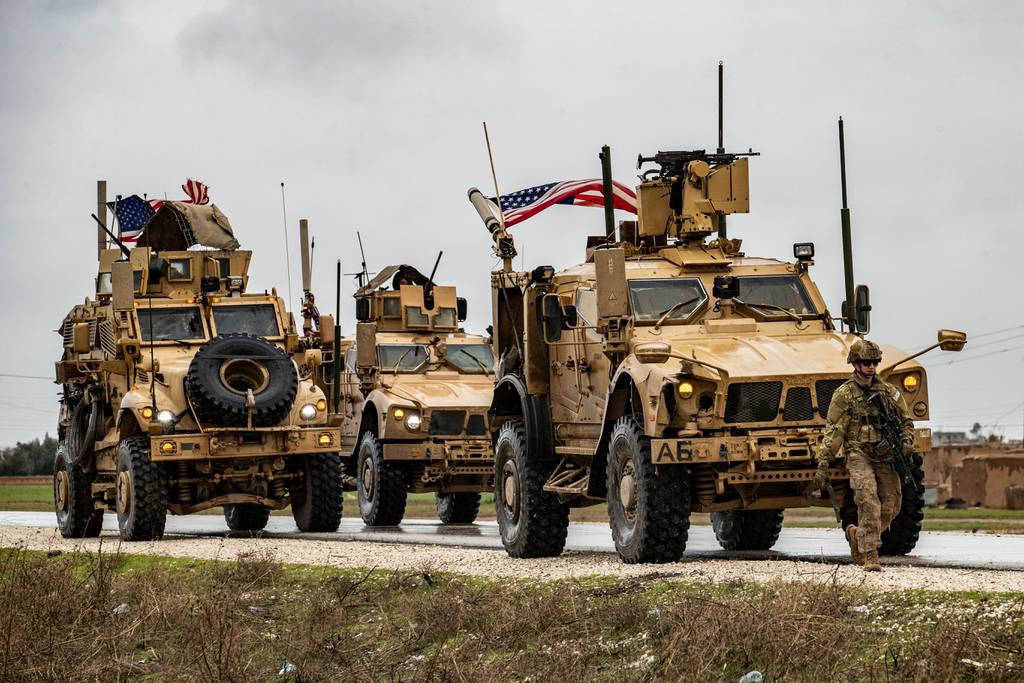 American soldiers patrol Syria's M4 highway