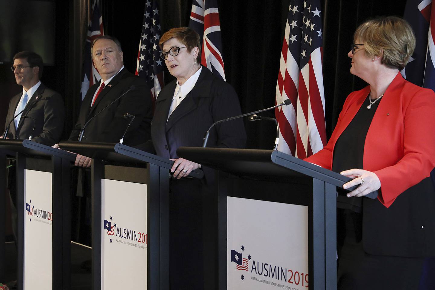 Australia's Foreign Minister Marise Payne, second from right, speaks during a joint news conference with U.S. Secretary of Defense Mark Esper, left, U.S. Secretary of State Mike Pompeo, second from left, and Australia's Defense Minister Linda Reynolds in Sydney, Australia, Sunday, Aug. 4, 2019.