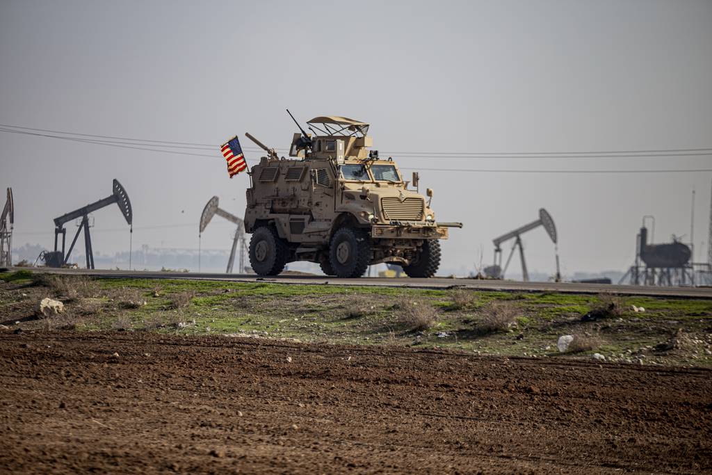 A U.S. military vehicle on a patrol in the countryside near the town of Qamishli, Syria, Sunday, Dec. 4, 2022.