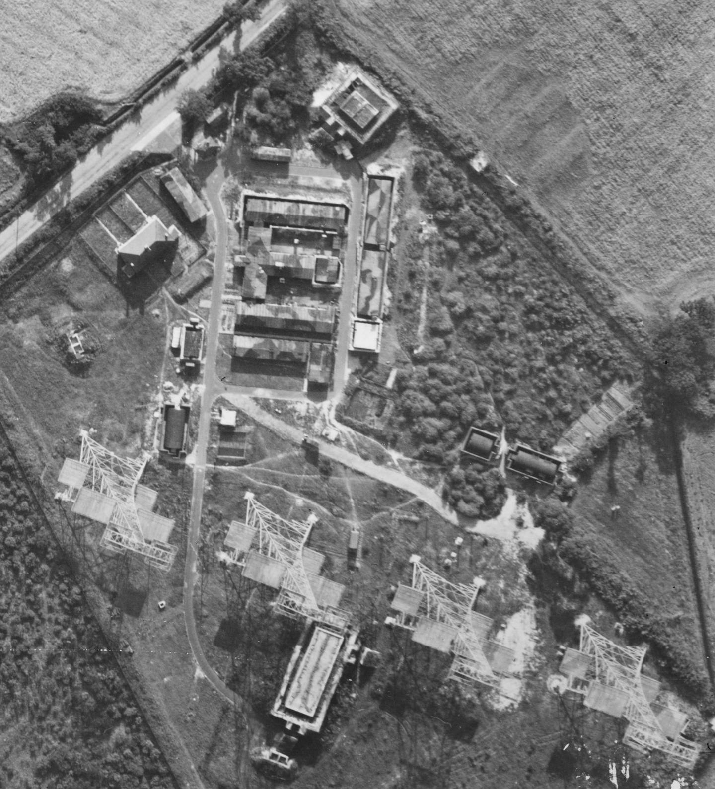 In this aerial photo released by the Historic England Archive taken by the United States Army Air Force, a view of Chain Home radar station in Darsham, England, on Aug. 5, 1944, showing the four transmitter aerial towers and camouflaged huts.