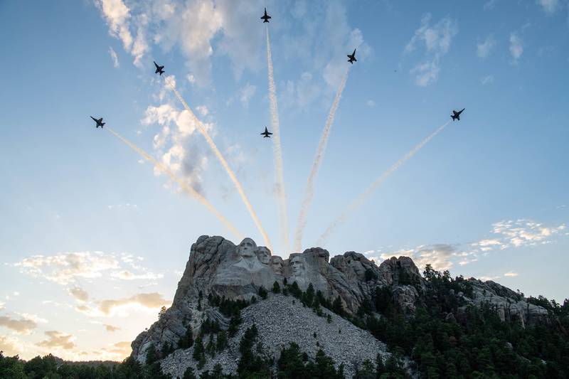 Blue Angels F-18 Hornets fly over Mount Rushmore during a Salute to America celebration hosted by the state of South Dakota July 3, 2020.