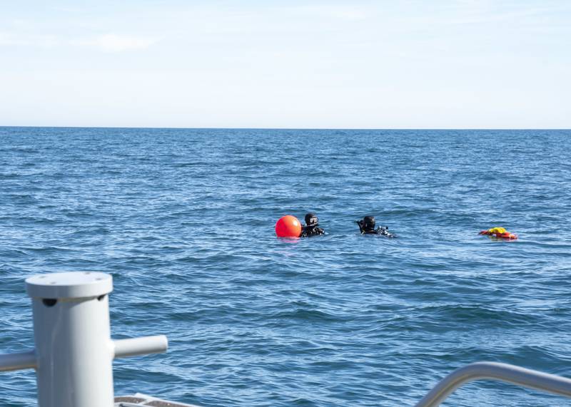 Sailors prepare to conduct a search for debris during recovery efforts of a high altitude balloon in the Atlantic Ocean, Feb. 7, 2023.