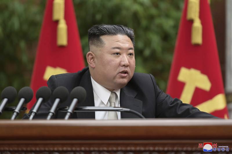 In this photo provided by the North Korean government, North Korean leader Kim Jong Un speaks during  a plenary meeting of the Workers’ Party of Korea at the party headquarters in Pyongyang, North Korea Tuesday, Dec. 27, 2022.