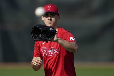Philadelphia Phillies pitcher Noah Song warms up at their baseball spring training facility in Clearwater, Fla., Thursday, Feb. 23, 2023.