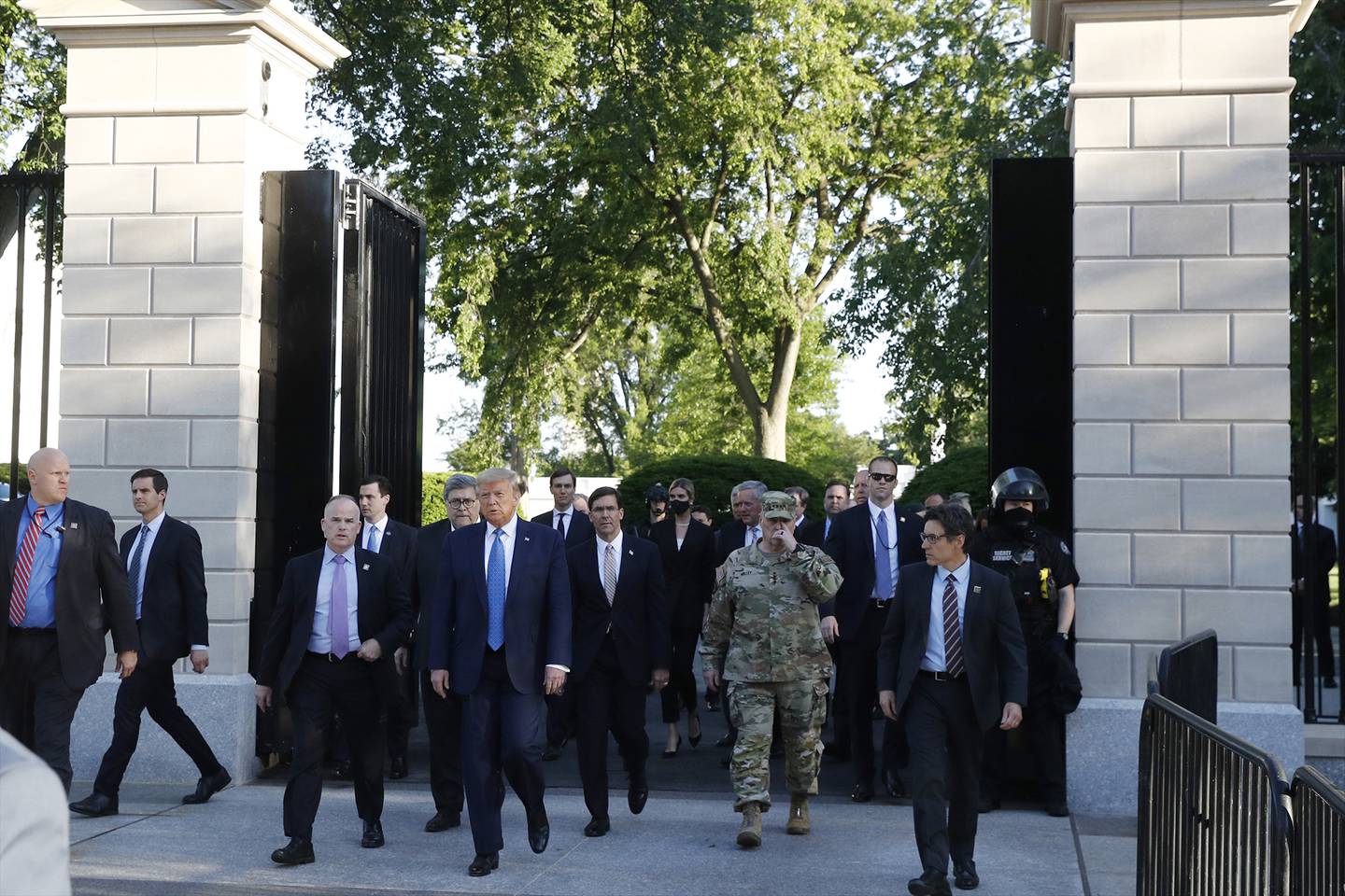 President Donald Trump walks from the gates of the White House to visit St. John's Church across Lafayette Park Monday, June 1, 2020, in Washington.