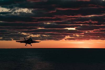 An F/A-18E Super Hornet prepares to make an arrested landing on the flight deck of the aircraft carrier USS Dwight D. Eisenhower (CVN 69) on April 9, 2017.