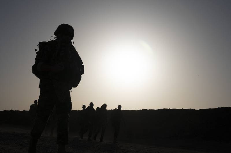 A U.S. service member participates in a memorial ruck at AB 201, Niger, Feb. 26, 2023.