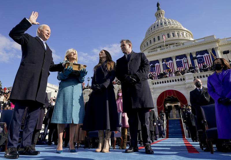 oe Biden is sworn in as the 46th president of the United States by Chief Justice John Roberts as Jill Biden holds the Bible during the 59th Presidential Inauguration at the U.S. Capitol in Washington, Wednesday, Jan. 20, 2021, as their children Ashley and Hunter watch.