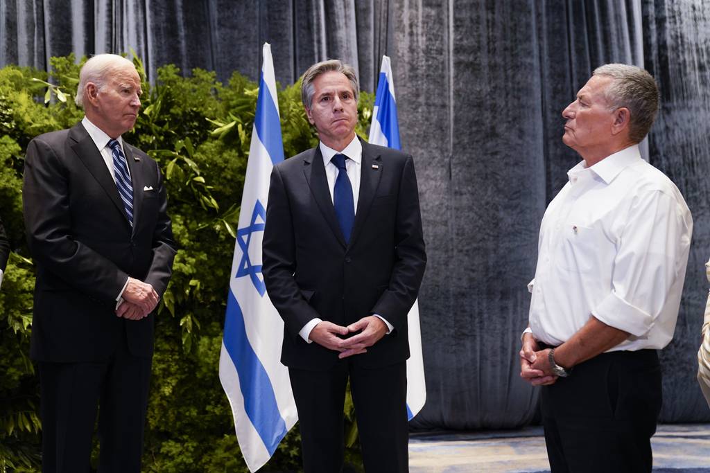 President Joe Biden and U.S. Secretary of State Antony Blinken, meet with victims' relatives and first responders who were directly affected by the Hamas attacks, Wednesday, Oct. 18, 2023, in Tel Aviv.