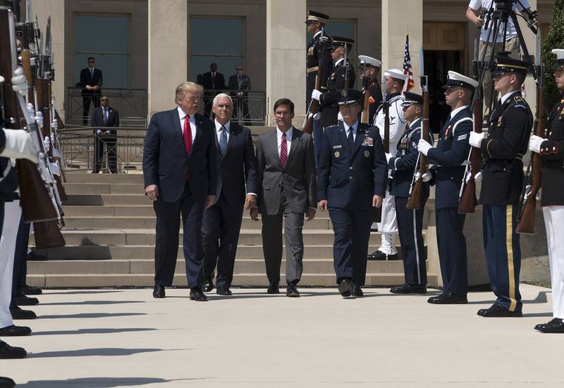 President Donald Trump, Vice President Michael Pence, Secretary of Defense Dr. Mark T. Esper and Air Force Gen. Paul J. Selva, vice chairman of the Joint Chiefs of Staff, participate in a full honors welcome ceremony for Secretary Esper at the Pentagon on July 25, 2019.