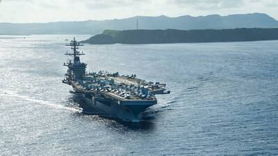 The aircraft carrier USS Theodore Roosevelt (CVN 71) operates in the Philippine Sea May 21, 2020, following an extended visit to Guam in the midst of the COVID-19 global pandemic.