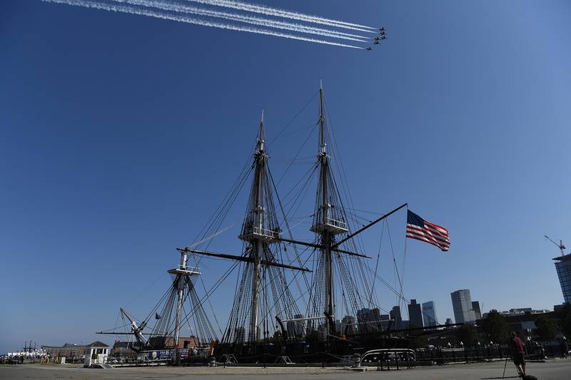 The U.S. Air Force Thunderbirds fly over the USS Constitution in Boston Harbor during a ‘Salute to Great Cities of the American Revolution’ on July 4, 2020. The Department of Defense conducted the flyover of Boston to recognize the role the city played in the birth of the nation.