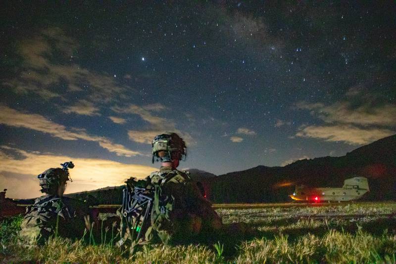 Soldiers conduct air assault operations training in total darkness to accomplish their mission during exercise Lightning Forge 2020 at Oahu, Hawaii July 17, 2020.
