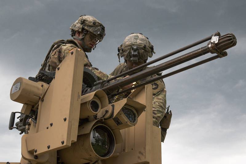 Iowa Army National Guard soldiers load a Common Remotely Operated Weapon Station during an eXportable Combat Training Capability rotation at Camp Ripley, Minn., on July 19, 2019.