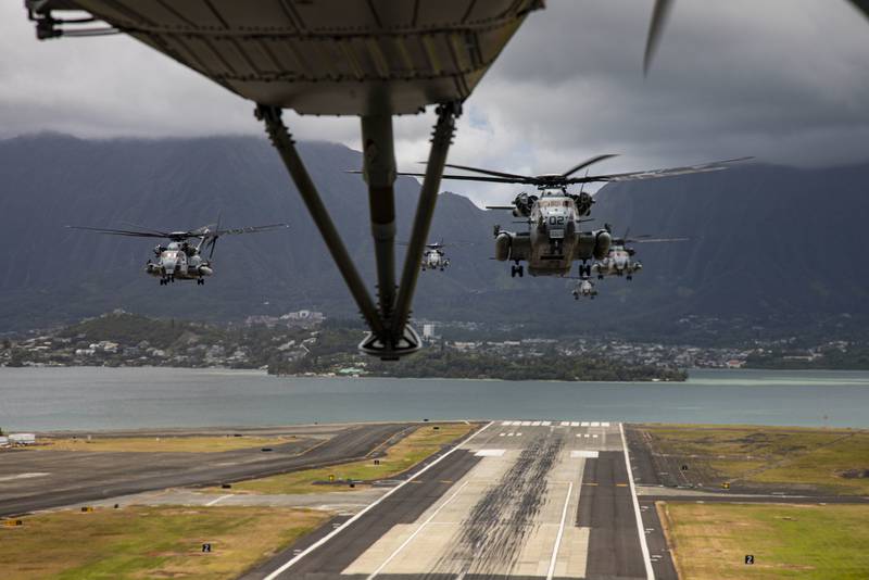 Marine Corps CH-53E Super Stallions take-off during a mass air-training mission on May 19, 2020, at Marine Corps Air Station Kaneohe Bay, Marine Corps Base Hawaii.