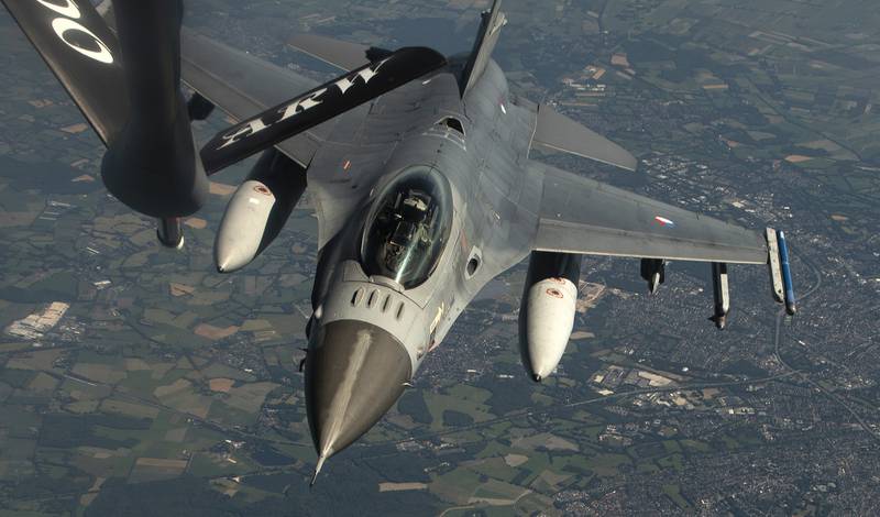 A Royal Netherlands air force F-16 Fighting Falcon approaches a U.S. Air Force KC-135 Stratotanker for refueling during a NATO Multinational Air Group exercise over Germany, June 25, 2020.