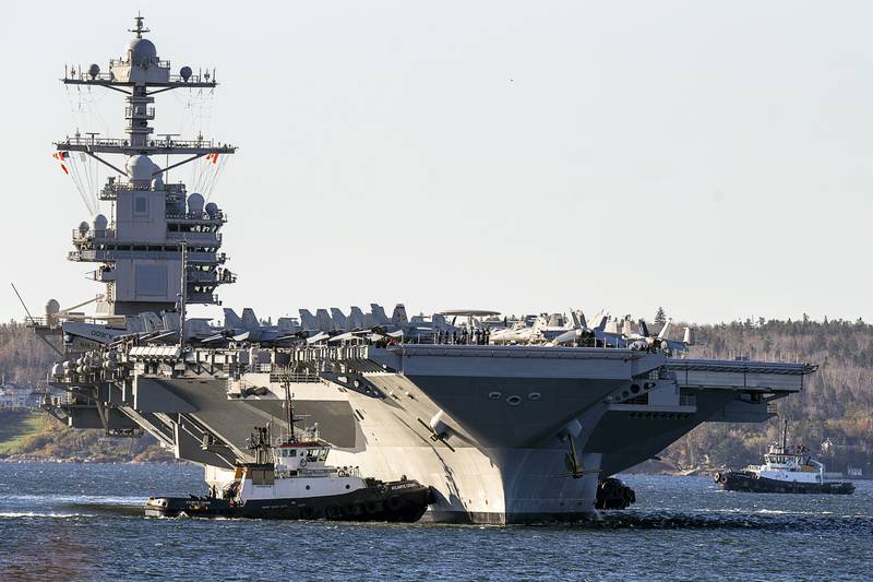 The USS Gerald R. Ford, one of the world's largest aircraft carriers, arrives in Halifax on Oct. 28, 2022.
