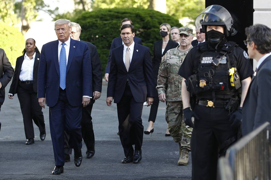 In this June 1, 2020, file photo President Donald Trump departs the White House to visit outside St. John's Church in Washington.