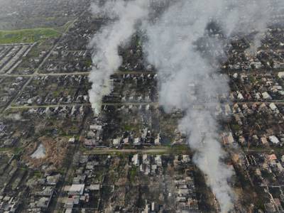 Smoke billows after Russian attacks in the outskirts of Bakhmut, Ukraine, Tuesday, Dec. 27, 2022.