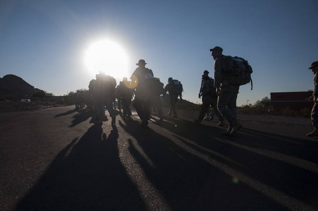 Participants of the Second Annual Ruck For Life ruck toward the buttes on Papago Park Military Reservation in Arizona on Oct. 14, 2015.