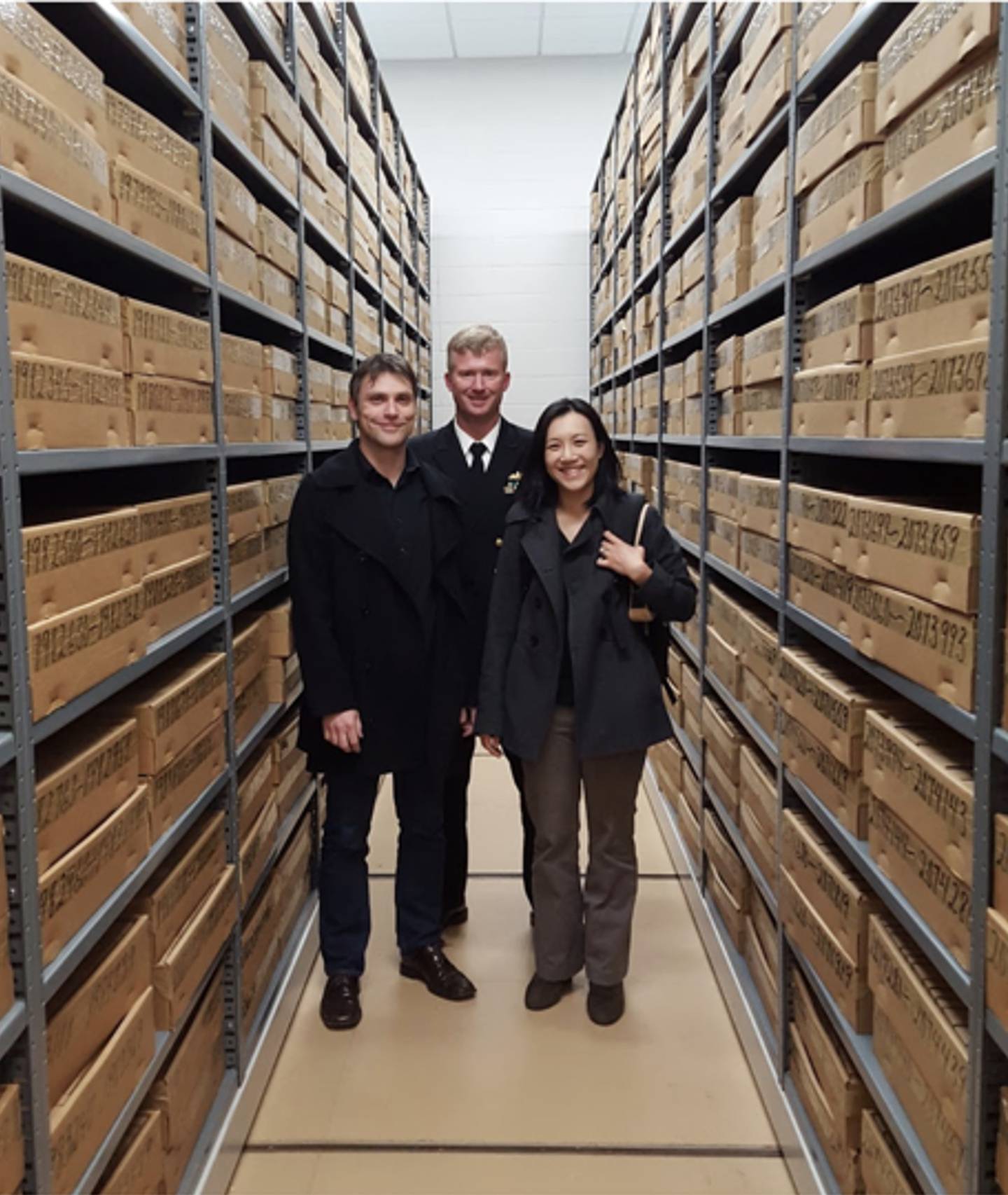 Olson, center, and Google scientists Martin Stumpe and Lily Peng took a private tour of the JPC collection in 2016.