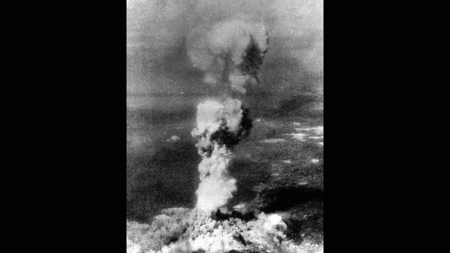 In this Aug. 6, 1945, file photo released by U.S. Air Force, a column of smoke rises 20,000 feet over Hiroshima, Japan, after the first atomic 5-ton "Little Boy" bomb was released.