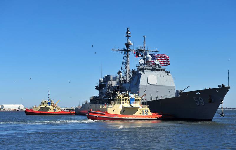 The guided-missile cruiser USS Philippine Sea (CG 58)  departs Naval Station Mayport, Fla., on Feb. 15, 2014, for a deployment in support of maritime security operations and theater security cooperation efforts in the U.S. 5th and 6th Fleet areas of responsibility.