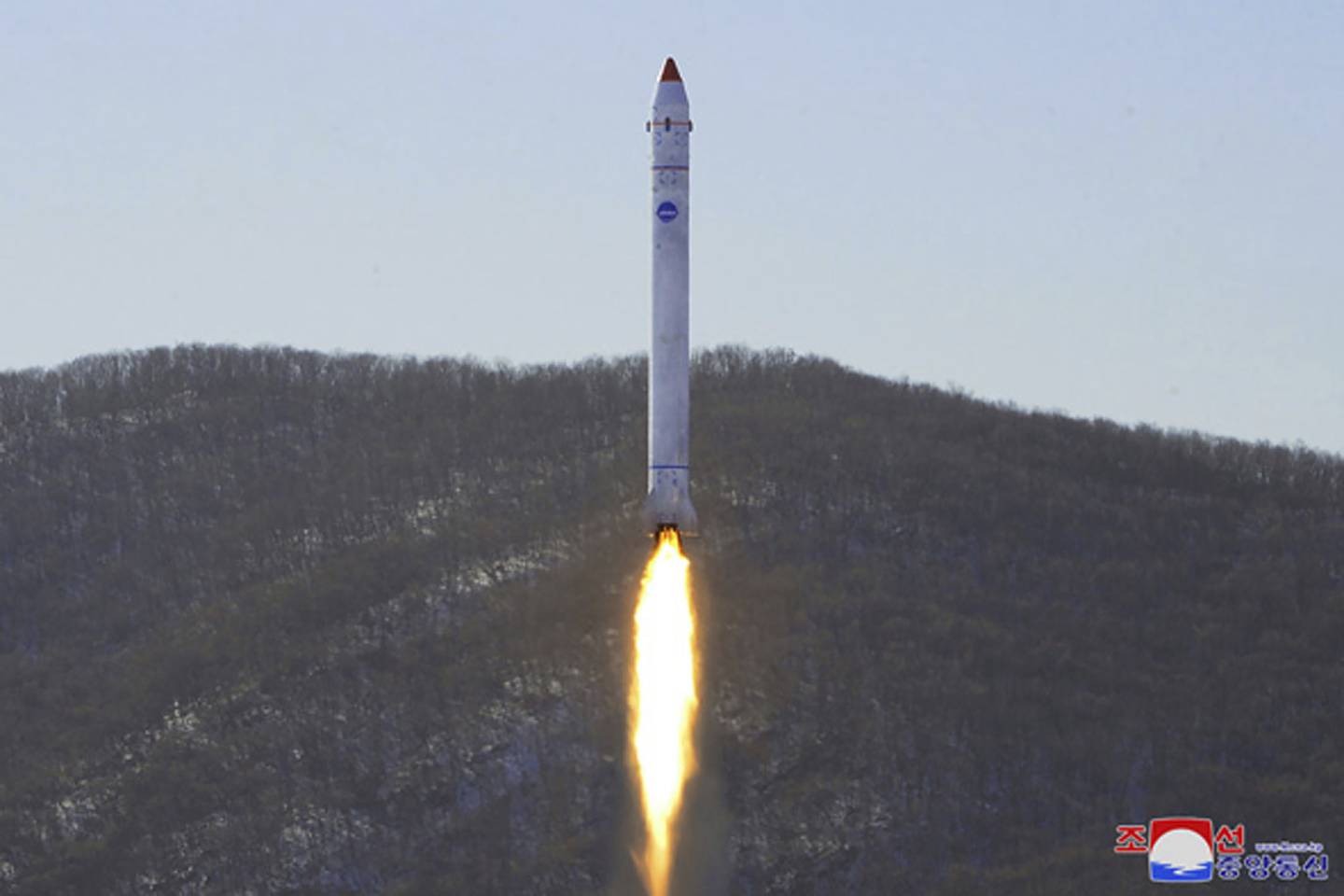 This photo provided by the North Korean government shows what it says is a test of a rocket with the test satellite at the Sohae Satellite Launching Ground in North Korea on Dec. 18, 2022.