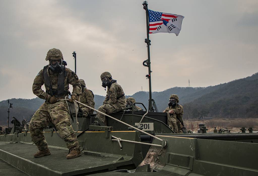 U.S. Army soldiers maneuver and connect a section of an Improved Ribbon Bridge during a rafting exercise on Namhan River, South Korea.
