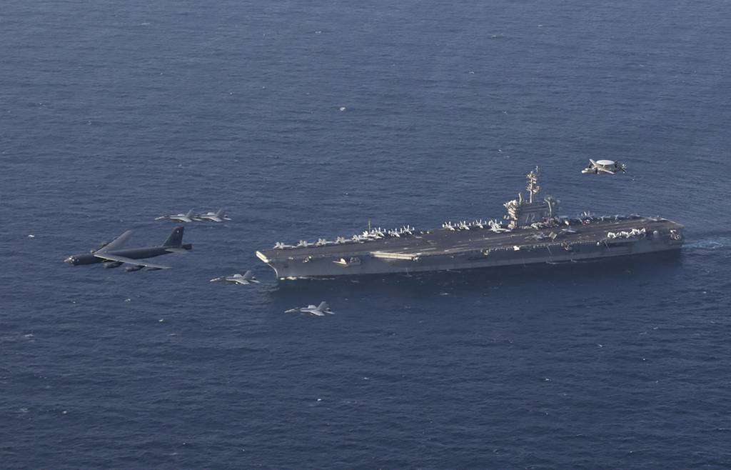 The Abraham Lincoln Carrier Strike Group and a U.S. Air Force B-52H Stratofortress conduct joint exercises in the Arabian Sea on June 1, 2019.
