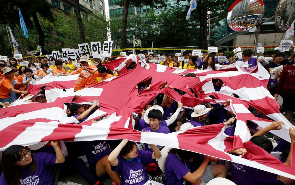 North Korea joins South Korean protest over Japan's 'Rising Sun
