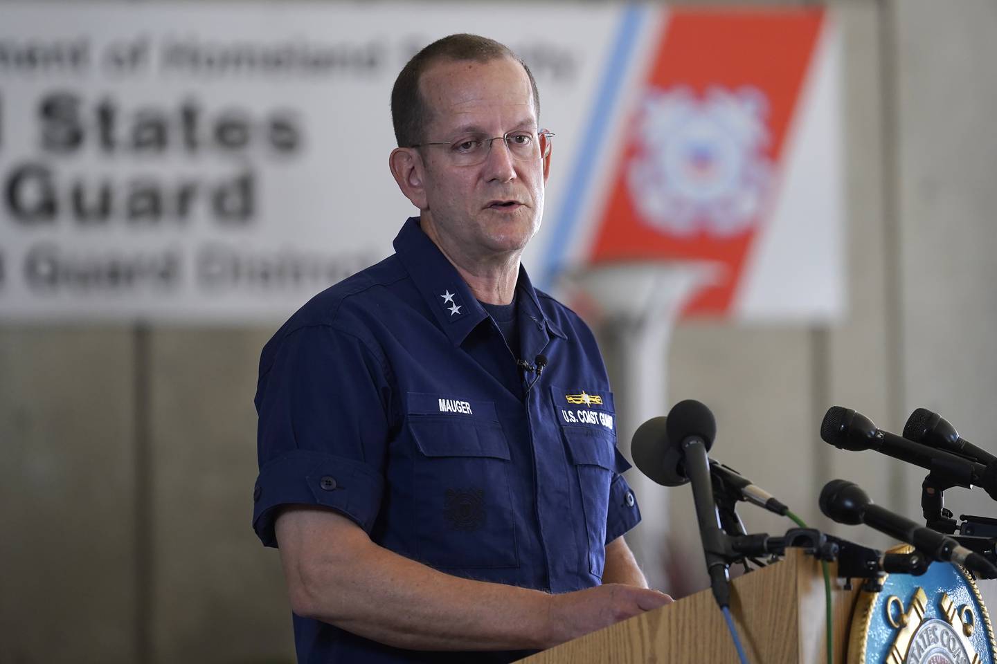 U.S. Coast Guard Rear Adm. John Mauger, commander of the First Coast Guard District, speaks to the media, Monday, June 19, 2023, in Boston.