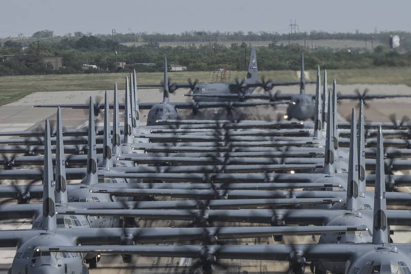 Multiple C-130J Super Hercules aircraft from the 317th Airlift Wing line up for takeoff during a Joint Forcible Entry exercise at Dyess Air Force Base, Texas, July 14, 2020.