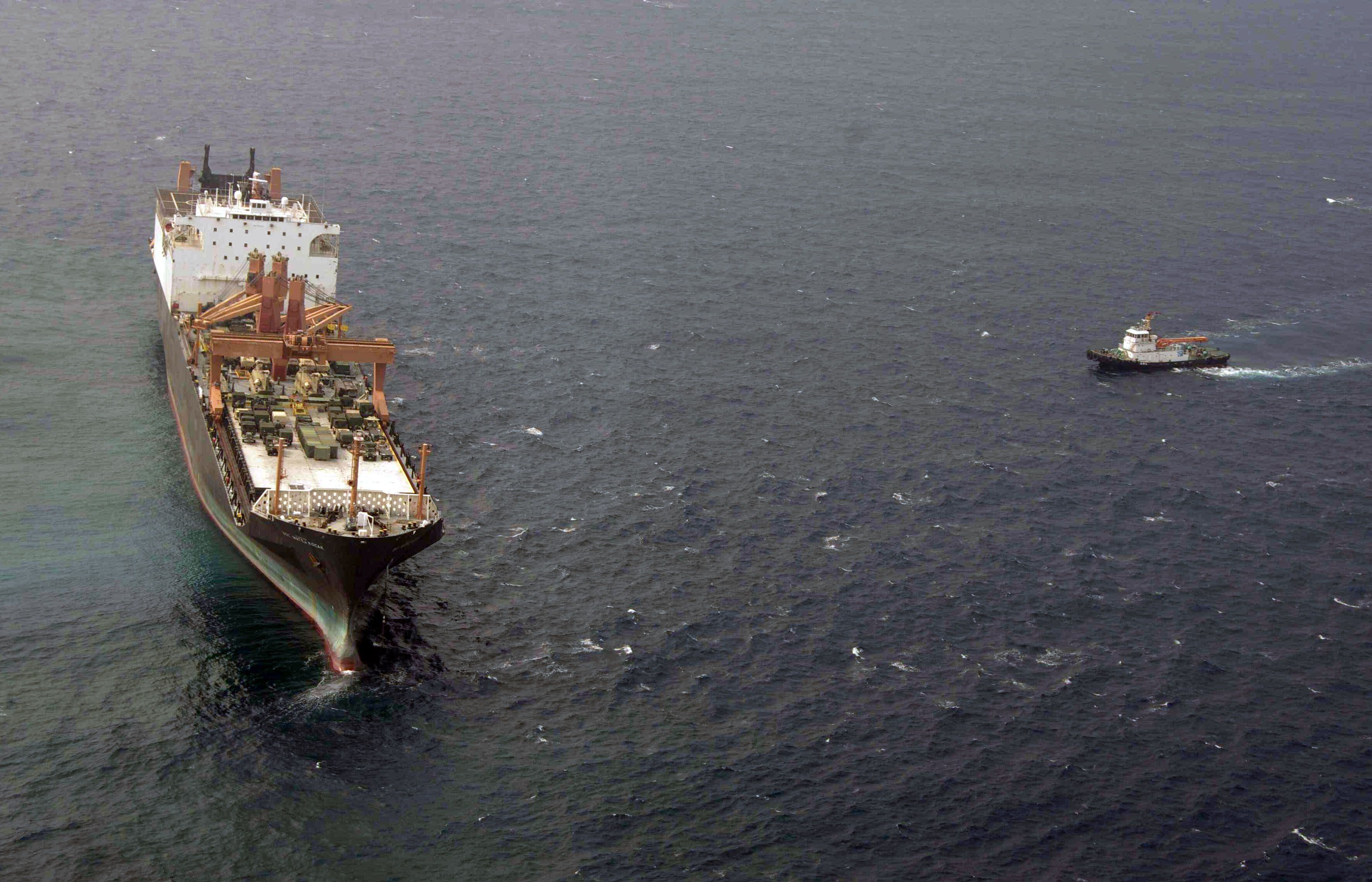 Grounded Navy cargo ship headed to shipyards for repairs