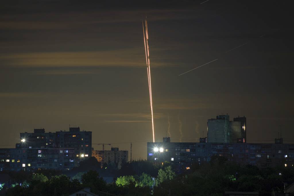 Russian rockets are launched against Ukraine from Russia's Belgorod region, seen from Kharkiv, Ukraine, Sunday, July 16, 2023.