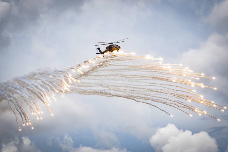 Airmen assigned to the 347th Rescue Group drop flares during a fini flight for Col. Bryan Creel, 347th RQG commander, June 5, 2020, at Moody Air Force Base, Ga.