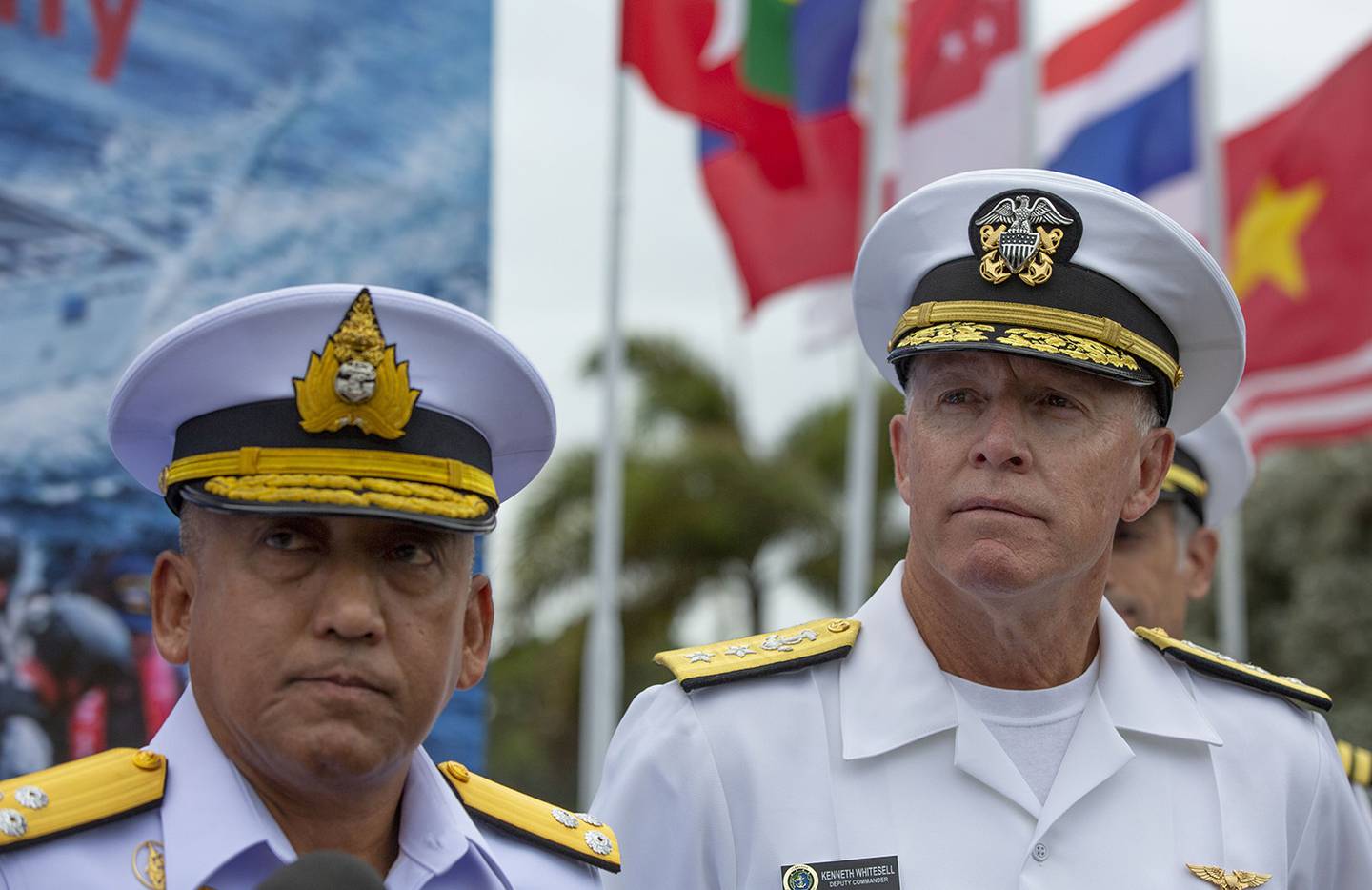 Vice Adm. Charoenpol Khumrasri, of Royal Thai Navy, left and Rear Adm. Kenneth Whitesell, of the U.S. Navy, participate in the inauguration ceremony of ASEAN-U.S. Maritime Exercise in Sattahip, Thailand, Monday, Sep. 2, 2019.