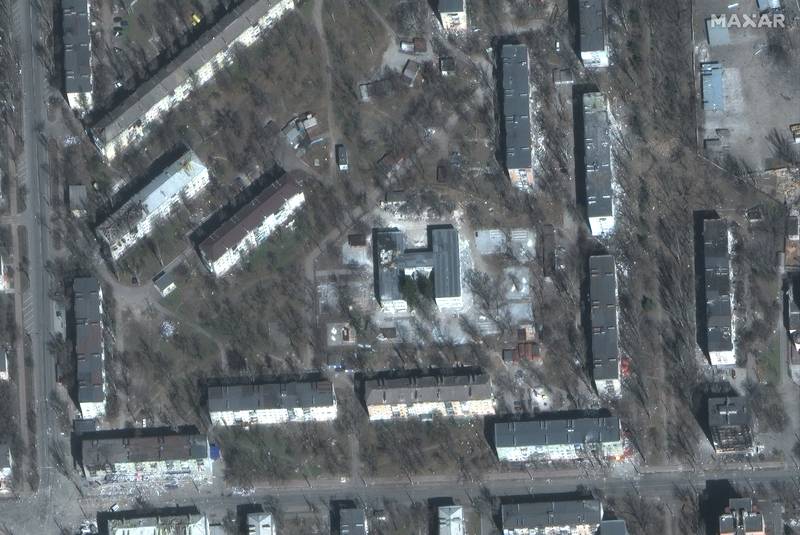 Satellite image shows damaged apartments on a street in Mariupol, Ukraine, March 29, 2022.
