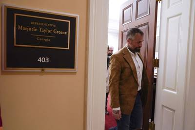 Former Washington Metropolitan Police Department officer Michael Fanone leaves Rep. Marjorie Taylor Greene's office after hand delivering a letter as the House meets for a second day to elect a speaker and convene the 118th Congress in Washington, Wednesday, Jan. 4, 2023.