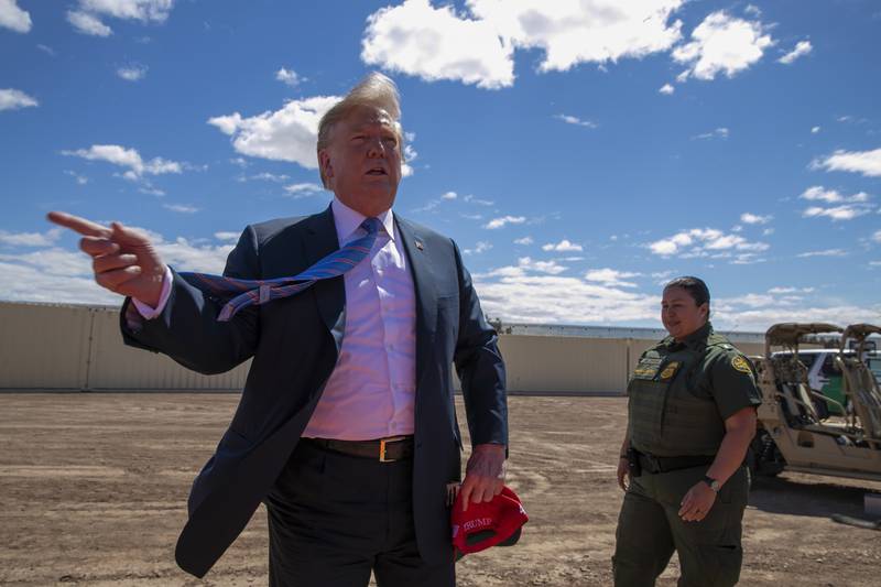 President Donald Trump speaks as he visits a new section of the border wall with Mexico in Calexico, Calif.