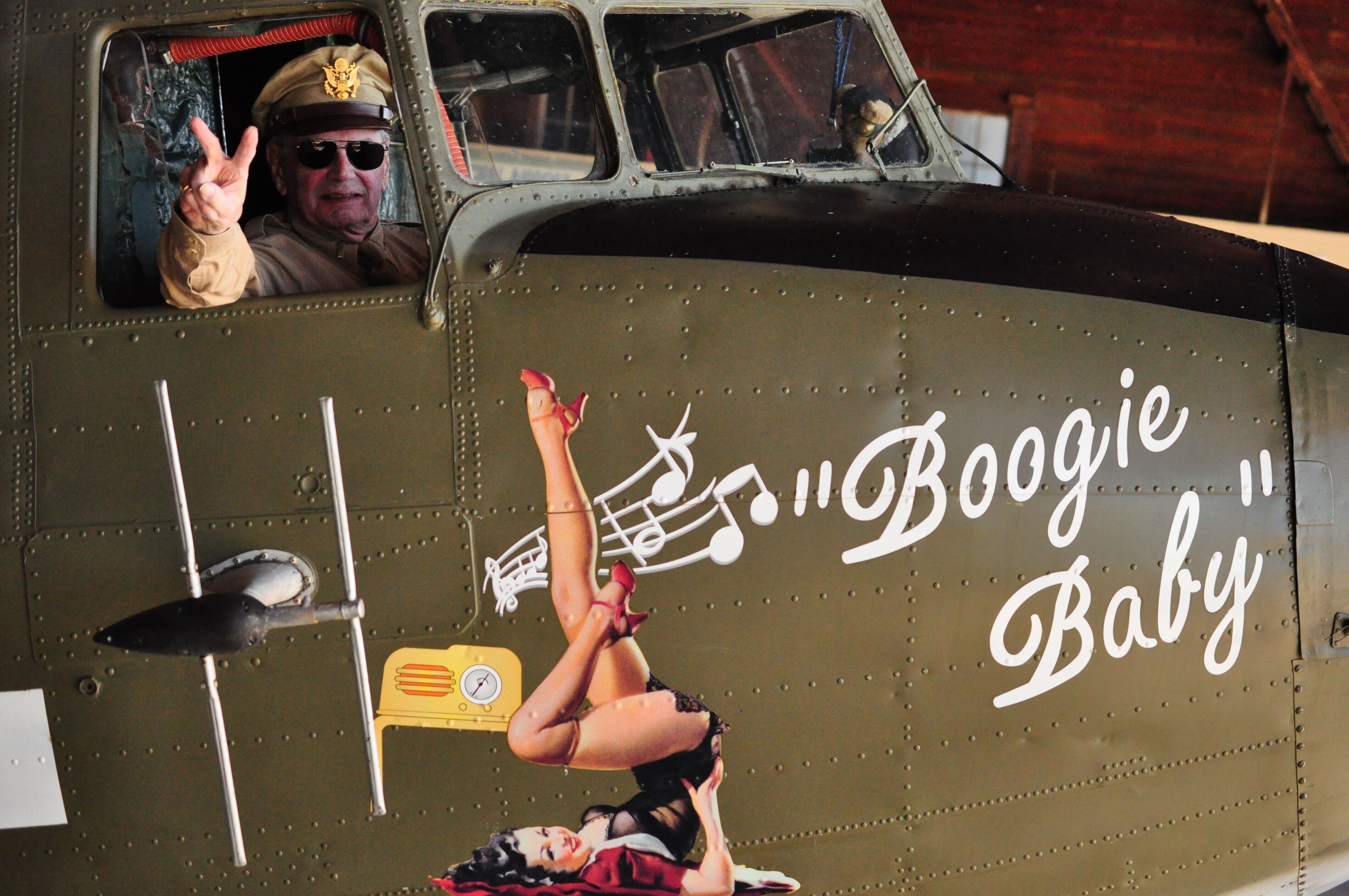 D-Day Pathfinder pilot Lt. Col. David Hamilton in the cockpit of the C-47 transport plane "Boogie Baby."
