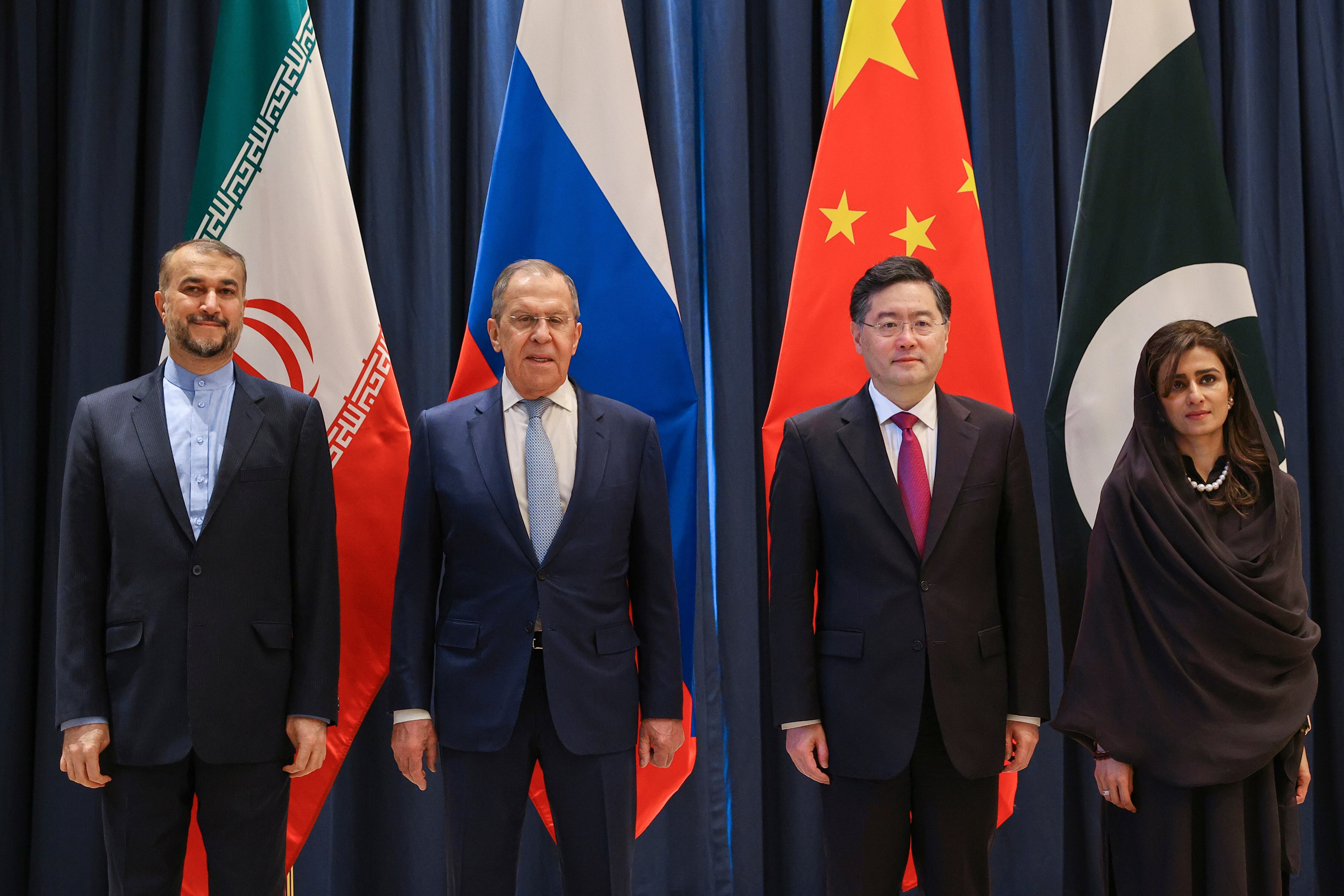 In this handout photo released by Russian Foreign Ministry Press Service, from left: Iranian Foreign Minister Hossein Amir-Abdollahian, Russian Foreign Minister Sergey Lavrov, Chinese Foreign Minister Qin Gang and Pakistani Minister of State for Foreign Affairs Hina Rabbani Khar pose for a group photo during a ministerial meeting in Samarkand, Uzbekistan, Thursday, April 13, 2023.