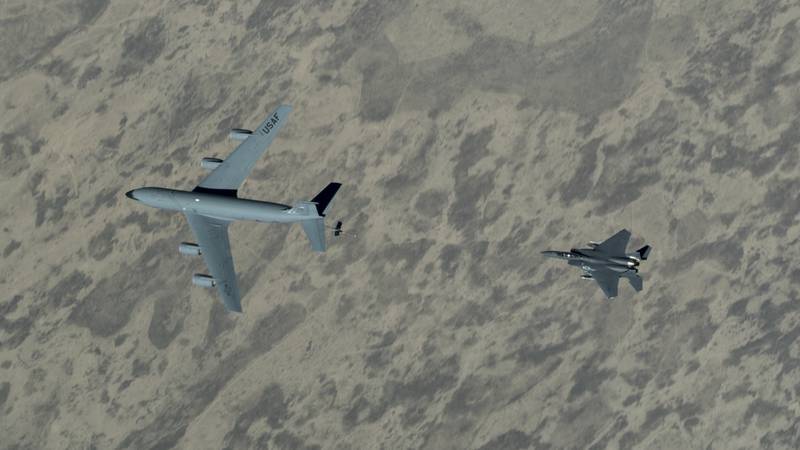 A U.S. Air Force F-15E Strike Eagle approaches a KC-135 Stratotanker over the U.S. Central Command area of responsibility on June 12, 2020.