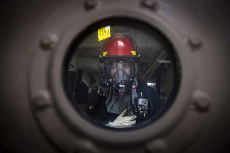 Chief Gunner's Mate Ken Marsh stands by as scene leader during a damage control drill aboard the Freedom-variant littoral combat ship USS Detroit (LCS 7) on July 3, 2020, in the Caribbean Sea.